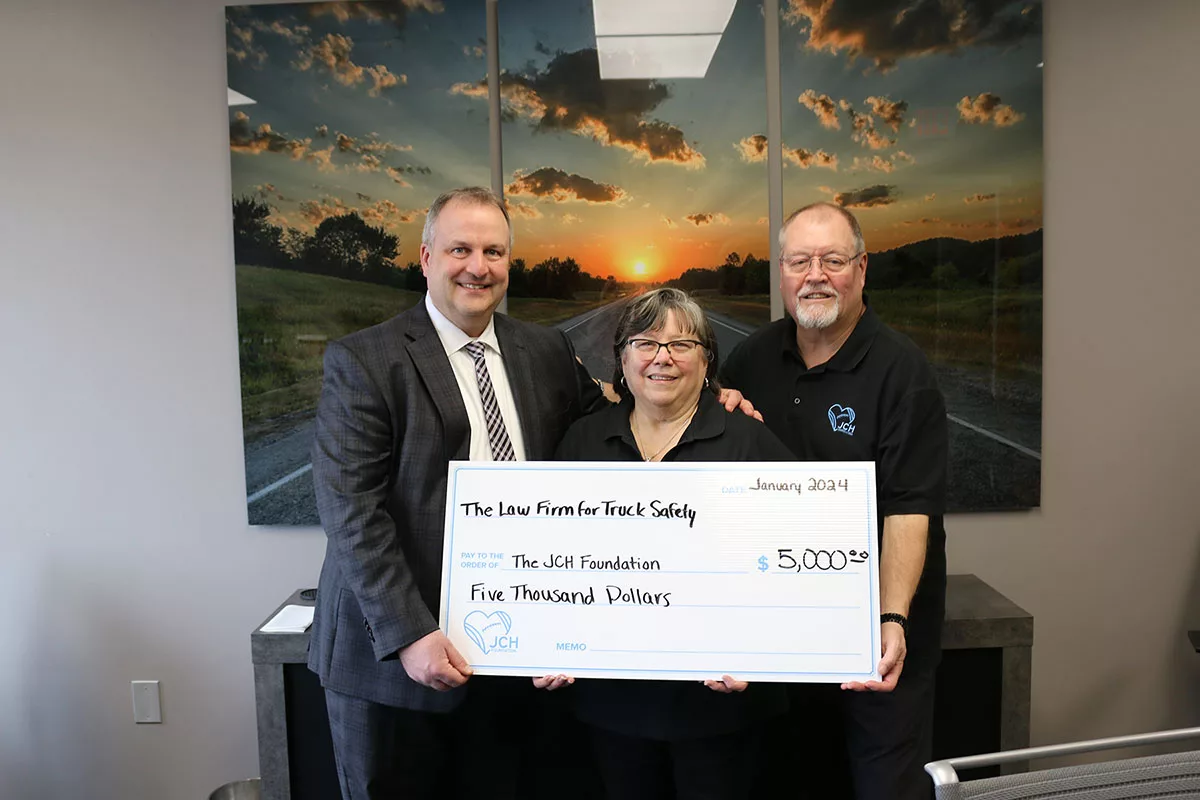 Pictured: Andy Young of The Law Firm for Truck Safety, LLP With Beth and Rick Haney of The JCH Foundation