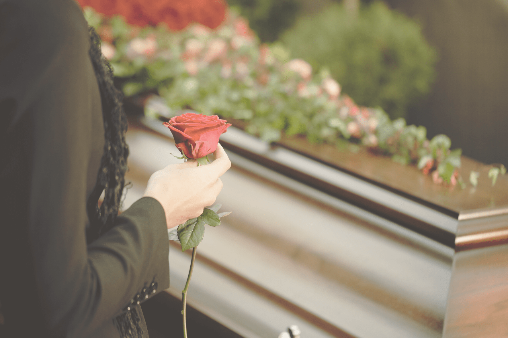 mourner at a casket